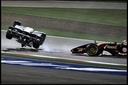 Esteban-Gutierrez-Sauber-C33-crashed-out-Pastor-Maldonado-Lotus-E22-FormulaOne-World-Championship-Bahrain-Grand-Prix-Race